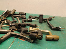 lot of 15 large reel handles with shaft
