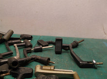 lot of 15 large reel handles with shaft
