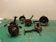 lot of 4 Mitchell reels with 1 hidden and 1 sport fisher for parts