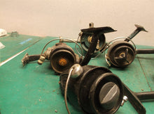 lot of 4 Mitchell reels with 1 hidden and 1 sport fisher for parts