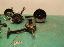 lot of 4 Mitchell reels with 1 hidden and 1 sport fisher for parts
