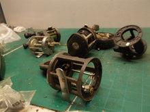 assorted parts off misc. bait caster reels