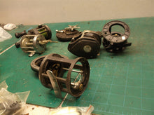 assorted parts off misc. bait caster reels
