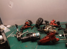 lot of 9 misc. fishing reels 5 working 4 for parts