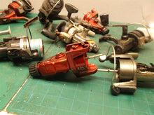 lot of 9 misc. fishing reels 5 working 4 for parts