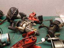 lot of 9 misc. fishing reels 5 working 4 for parts
