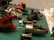 lot of 9 misc. fishing reels 5 working 4 for parts