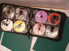cd case with 72 misc cds
