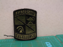 US Army Leadership / Excellence subdued sew on patch green and black