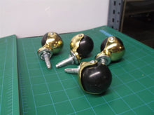lot of 4 gold open face casters
