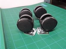 lot of 4 screw on casters