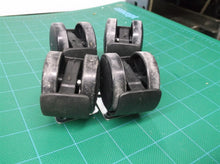 lot of 4 screw on casters