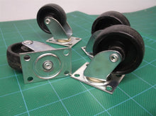 lot of 4 1.5" casters with 4 screw holes