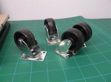 lot of 4 1.5" casters with 4 screw holes