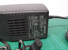 model 36635-3113 ac/dc adapter 12v 2a