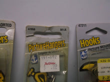 lot of 47050, 47211, and 47200 hangers and hooks