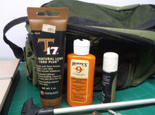 Field & stream bag with gun cleaning supplies
