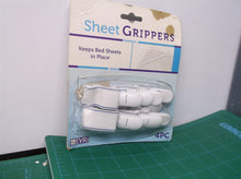 EVRI 4 pc. ELASTIC BED SHEET GRIPPERS WHITE NEW IN PACKAGE