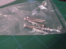 lot of 6 1-5/8" x 1/8" surgical screws with 3.5mm hex head