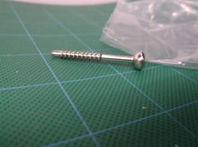 lot of 6 1-5/8" x 1/8" surgical screws with 3.5mm hex head