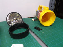Assorted parts for a lumilite 4600 Krypton Yellow Flashlight Waterproof Lantern