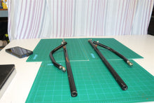 Pair of seat support arms for a 21st Century Scientific Inc Bounder Plus Off-Roa