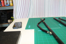 Pair of seat support arms for a 21st Century Scientific Inc Bounder Plus Off-Roa