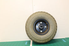 Rim & drive tire flat free Left front staleation wheel assembly off a Pride quan