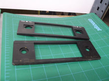 2 vintage car radio face plates