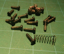 Assortment Of Screws Off Of a Ryobi P2108 18V Blower