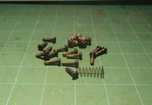 Assortment Of Screws Off Of a Ryobi P2108 18V Blower